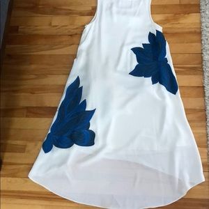 White dress with bright blue flowers